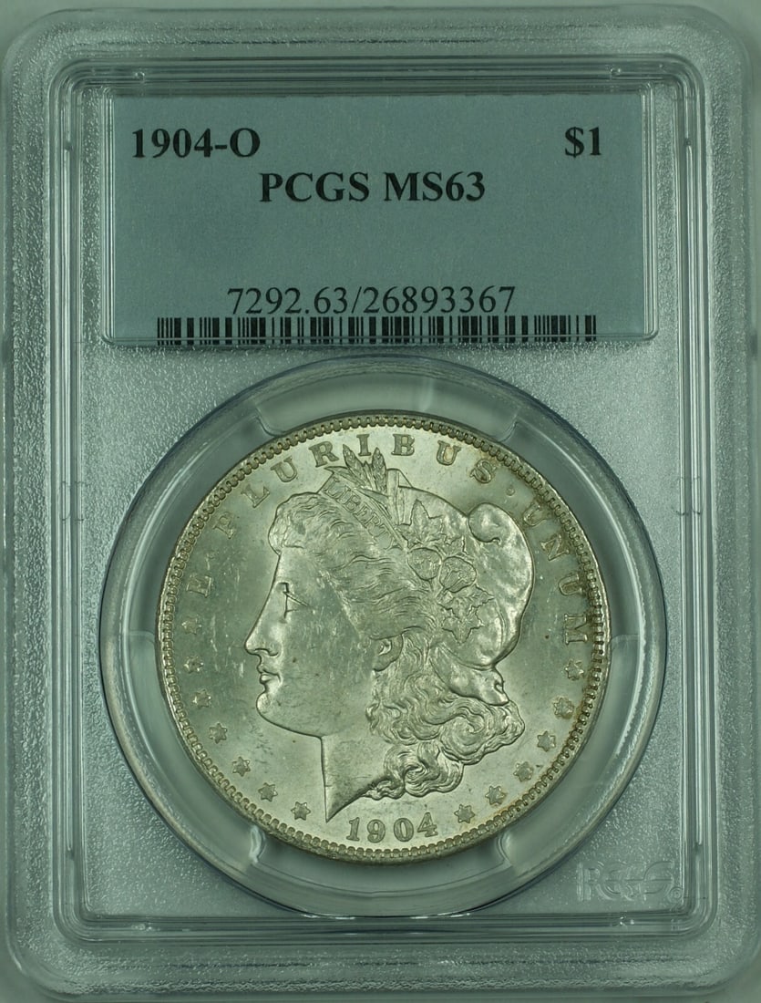1904-O New Orleans Morgan Dollar Silver $1 PCGS MS63 Certified Coin: 1904-O New Orleans Morgan Dollar Silver $1 PCGS MS63 Certified Coin This 1904-O Morgan Silver Dollar is an uncirculated coin certified by PCGS with a grade of MS 63. Minted in New Orleans, it features