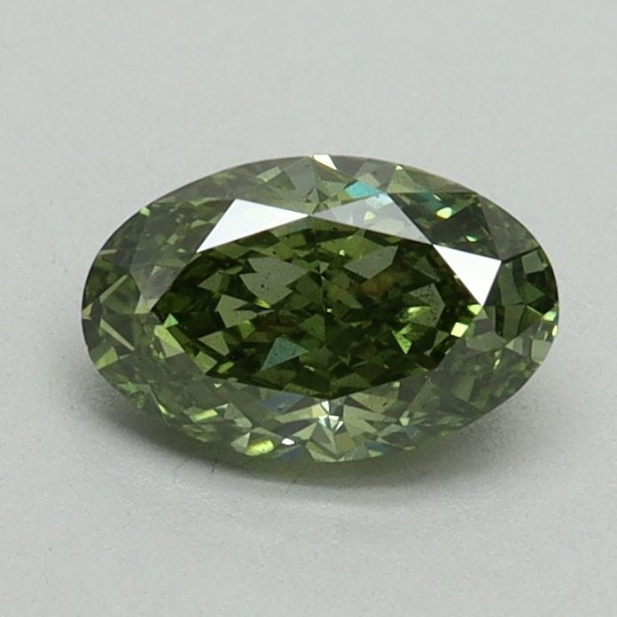 Loose Diamond - OVAL 0.74ct Fancy Vivid Green SI1: Loose Diamond - OVAL 0.74ct Fancy Vivid Green SI1 Source: This is a real non-mined Diamond that has been grown in a lab Shape: OVAL Carats: 0.74 Color: Fancy Vivid Green Certification: IGI Video: