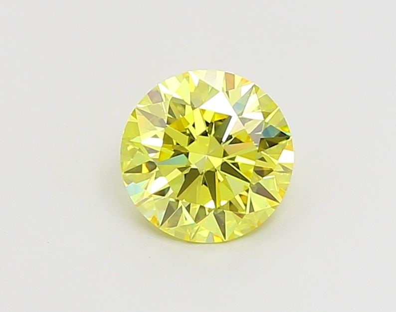 Ideal Loose Diamond - ROUND 1.06ct Fancy Vivid Yellow VVS1: Ideal Loose Diamond - ROUND 1.06ct Fancy Vivid Yellow VVS1 Source: This is a real non-mined Diamond that has been grown in a lab Shape: ROUND Carats: 1.06 Color: Fancy Vivid Yellow Certification: IGI 