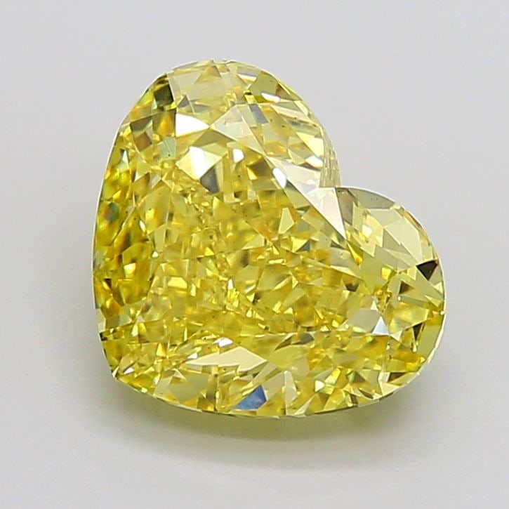 Loose Diamond - HEART 10.31ct Fancy Vivid Yellow VS2: Loose Diamond - HEART 10.31ct Fancy Vivid Yellow VS2 Source: This is a real non-mined Diamond that has been grown in a lab Shape: HEART Carats: 10.31 Color: Fancy Vivid Yellow Certification: IGI Video