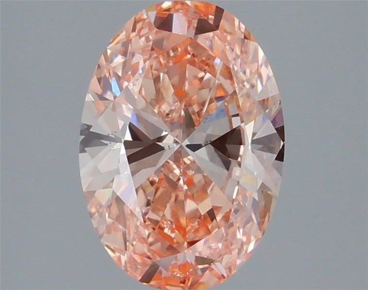 Loose Diamond - OVAL 2.1ct Fancy Vivid Pink VS2: Loose Diamond - OVAL 2.1ct Fancy Vivid Pink VS2 Source: This is a real non-mined Diamond that has been grown in a lab Shape: OVAL Carats: 2.1 Color: Fancy Vivid Pink Certification: IGI Video: