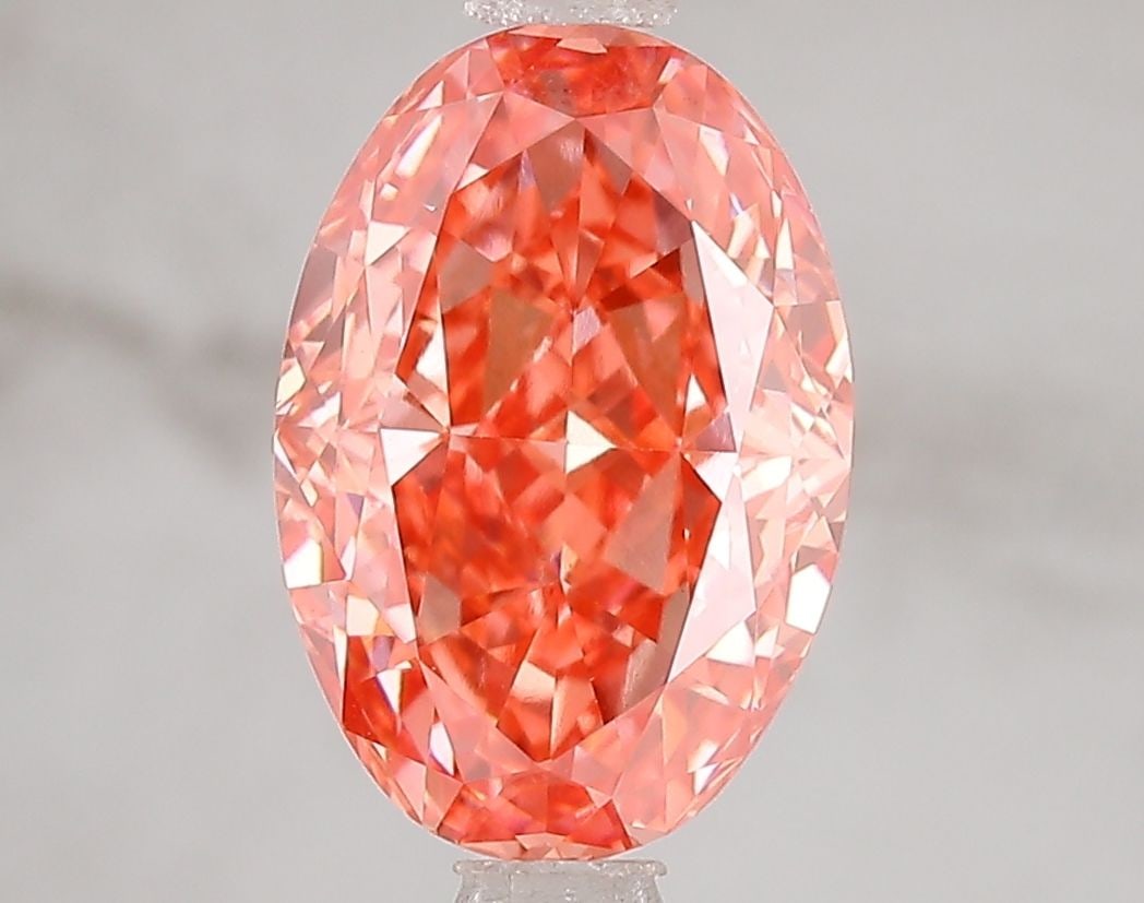 Loose Diamond - OVAL 3.1ct Fancy Vivid Pink VVS2: Loose Diamond - OVAL 3.1ct Fancy Vivid Pink VVS2 Source: This is a real non-mined Diamond that has been grown in a lab Shape: OVAL Carats: 3.1 Color: Fancy Vivid Pink Certification: IGI Video: