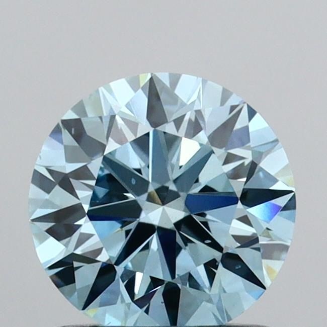 Ideal Loose Diamond - ROUND 1.0ct Fancy Vivid Blue VS2: Ideal Loose Diamond - ROUND 1.0ct Fancy Vivid Blue VS2 Source: This is a real non-mined Diamond that has been grown in a lab Shape: ROUND Carats: 1.0 Color: Fancy Vivid Blue Certification: IGI Video: