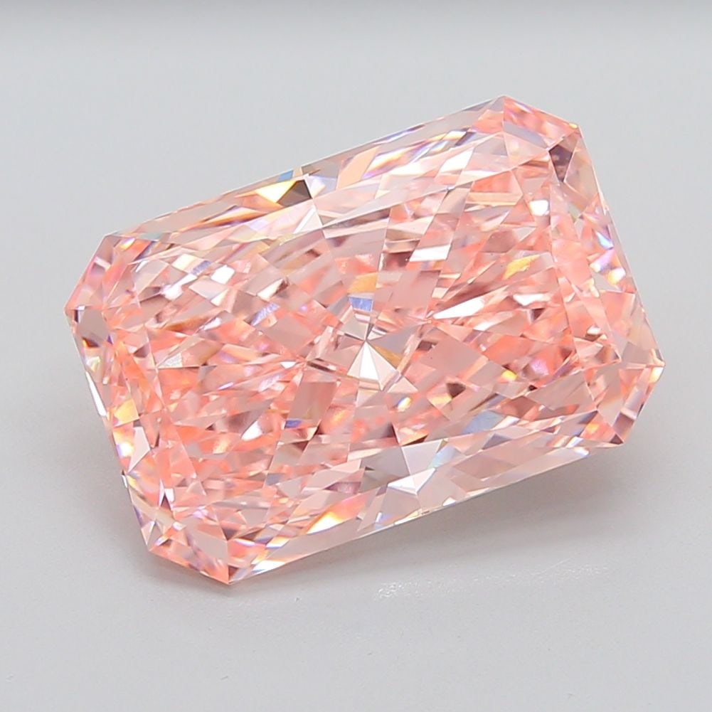 Loose Diamond - RADIANT 12.3ct Fancy Vivid Pink VS1: Loose Diamond - RADIANT 12.3ct Fancy Vivid Pink VS1 Source: This is a real non-mined Diamond that has been grown in a lab Shape: RADIANT Carats: 12.3 Color: Fancy Vivid Pink Certification: IGI Additio