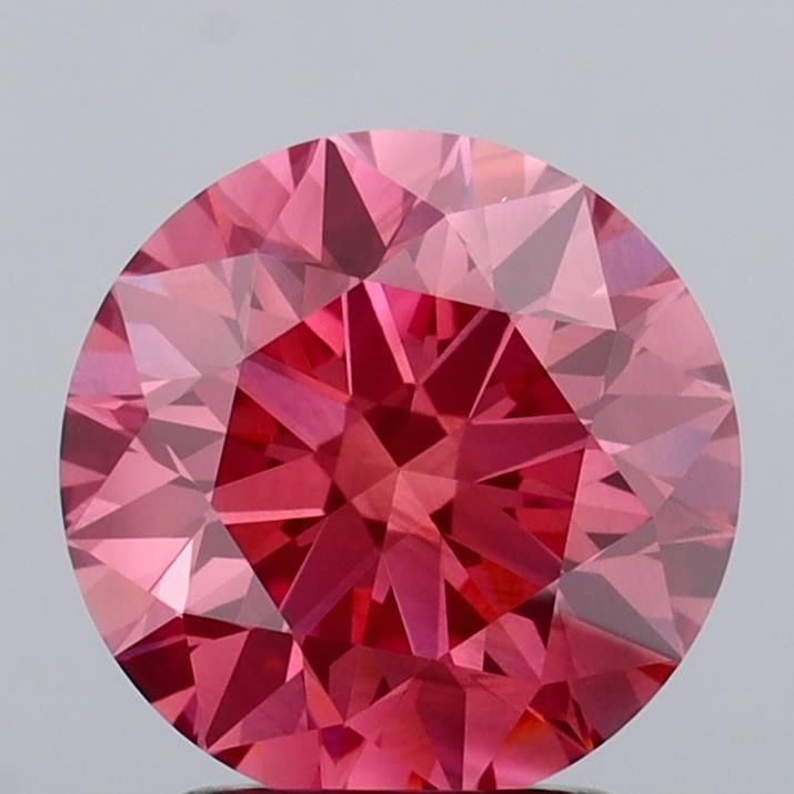 Loose Diamond - ROUND 2.3ct Fancy Vivid Pink VS2: Loose Diamond - ROUND 2.3ct Fancy Vivid Pink VS2 Source: This is a real non-mined Diamond that has been grown in a lab Shape: ROUND Carats: 2.3 Color: Fancy Vivid Pink Certification: IGI Video: