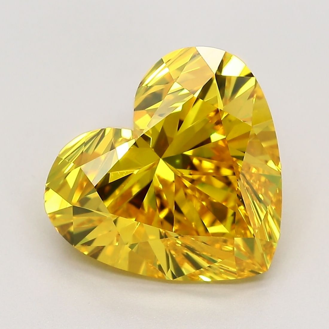 Loose Diamond - HEART 5.1ct Fancy Vivid Yellow VS1: Loose Diamond - HEART 5.1ct Fancy Vivid Yellow VS1 Source: This is a real non-mined Diamond that has been grown in a lab Shape: HEART Carats: 5.1 Color: Fancy Vivid Yellow Certification: IGI Video: