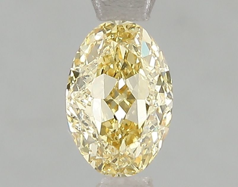 Loose Diamond - OVAL 1.02ct Fancy Intense Yellow VS2: Loose Diamond - OVAL 1.02ct Fancy Intense Yellow VS2 Source: This is a real non-mined Diamond that has been grown in a lab Shape: OVAL Carats: 1.02 Color: Fancy Intense Yellow Certification: IGI Video