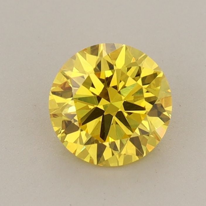 Loose Diamond - ROUND 0.73ct Fancy Vivid Yellow VS1: Loose Diamond - ROUND 0.73ct Fancy Vivid Yellow VS1 Source: This is a real non-mined Diamond that has been grown in a lab Shape: ROUND Carats: 0.73 Color: Fancy Vivid Yellow Certification: IGI Video: