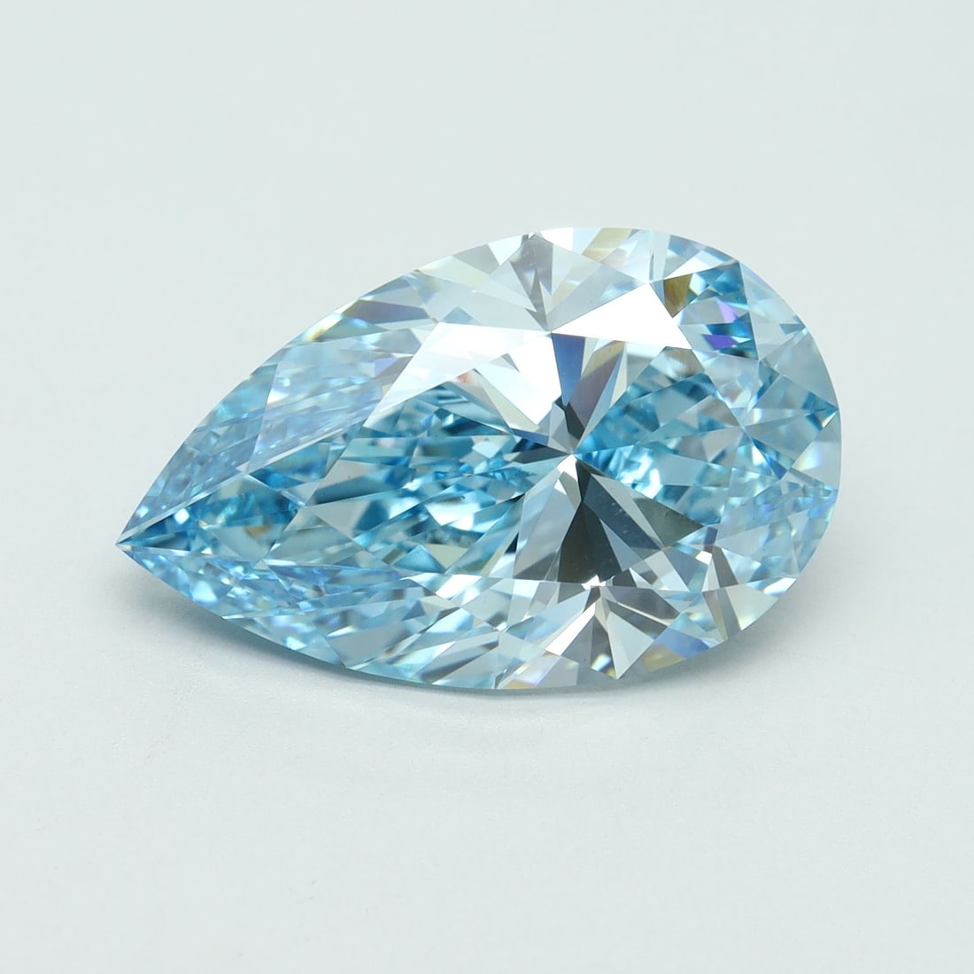 Loose Diamond - PEAR 7.06ct Fancy Vivid Blue VVS2: Loose Diamond - PEAR 7.06ct Fancy Vivid Blue VVS2 Source: This is a real non-mined Diamond that has been grown in a lab Shape: PEAR Carats: 7.06 Color: Fancy Vivid Blue Certification: IGI Video:
