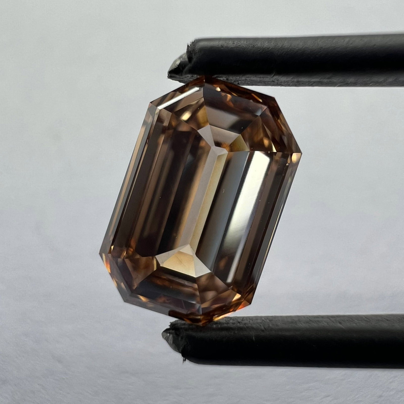 Loose Diamond - EMERALD 2.15ct Orange VS1: Loose Diamond - EMERALD 2.15ct Orange VS1 Source: This is a real non-mined Diamond that has been grown in a lab Shape: EMERALD Carats: 2.15 Color: Orange Certification: NONE Additional images availabl