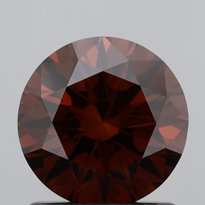 Loose Diamond - ROUND 1.16ct Fancy Deep Orangey Brown VS1: Loose Diamond - ROUND 1.16ct Fancy Deep Orangey Brown VS1 Source: This is a real non-mined Diamond that has been grown in a lab Shape: ROUND Carats: 1.16 Color: Fancy Deep Orangey Brown Certification: