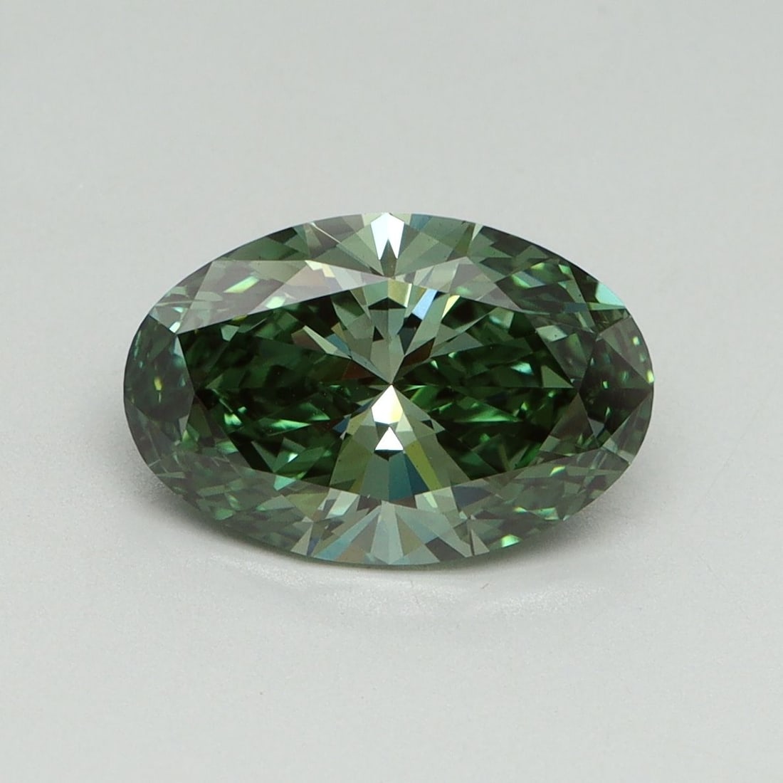 Loose Diamond - OVAL 2.15ct Fancy Vivid Green VS1: Loose Diamond - OVAL 2.15ct Fancy Vivid Green VS1 Source: This is a real non-mined Diamond that has been grown in a lab Shape: OVAL Carats: 2.15 Color: Fancy Vivid Green Certification: IGI Video: