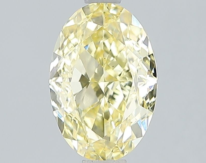 Loose Diamond - OVAL 1.98ct Fancy Vivid Yellow VS2: Loose Diamond - OVAL 1.98ct Fancy Vivid Yellow VS2 Source: This is a real non-mined Diamond that has been grown in a lab Shape: OVAL Carats: 1.98 Color: Fancy Vivid Yellow Certification: IGI Video: