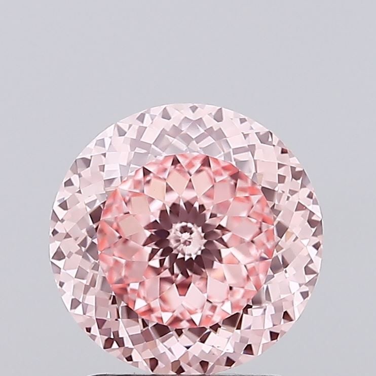 Loose Diamond - ROUND 2.01ct Fancy Vivid Pink VS1: Loose Diamond - ROUND 2.01ct Fancy Vivid Pink VS1 Source: This is a real non-mined Diamond that has been grown in a lab Shape: ROUND Carats: 2.01 Color: Fancy Vivid Pink Certification: IGI Video: