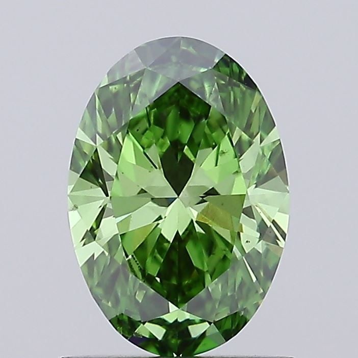Loose Diamond - OVAL 1.03ct Fancy Vivid Green VS1: Loose Diamond - OVAL 1.03ct Fancy Vivid Green VS1 Source: This is a real non-mined Diamond that has been grown in a lab Shape: OVAL Carats: 1.03 Color: Fancy Vivid Green Certification: IGI Video: