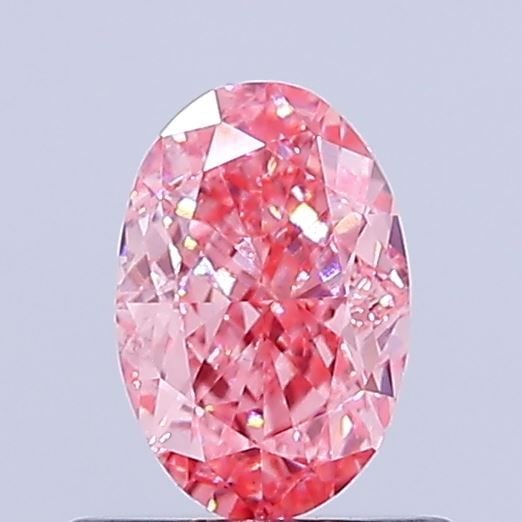 Loose Diamond - OVAL 0.75ct Fancy Vivid Pink VS2: Loose Diamond - OVAL 0.75ct Fancy Vivid Pink VS2 Source: This is a real non-mined Diamond that has been grown in a lab Shape: OVAL Carats: 0.75 Color: Fancy Vivid Pink Certification: IGI Video: