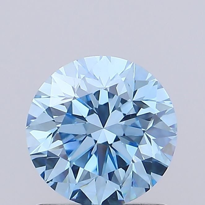 Loose Diamond - ROUND 0.73ct Fancy Vivid Blue VVS2: Loose Diamond - ROUND 0.73ct Fancy Vivid Blue VVS2 Source: This is a real non-mined Diamond that has been grown in a lab Shape: ROUND Carats: 0.73 Color: Fancy Vivid Blue Certification: IGI Video: