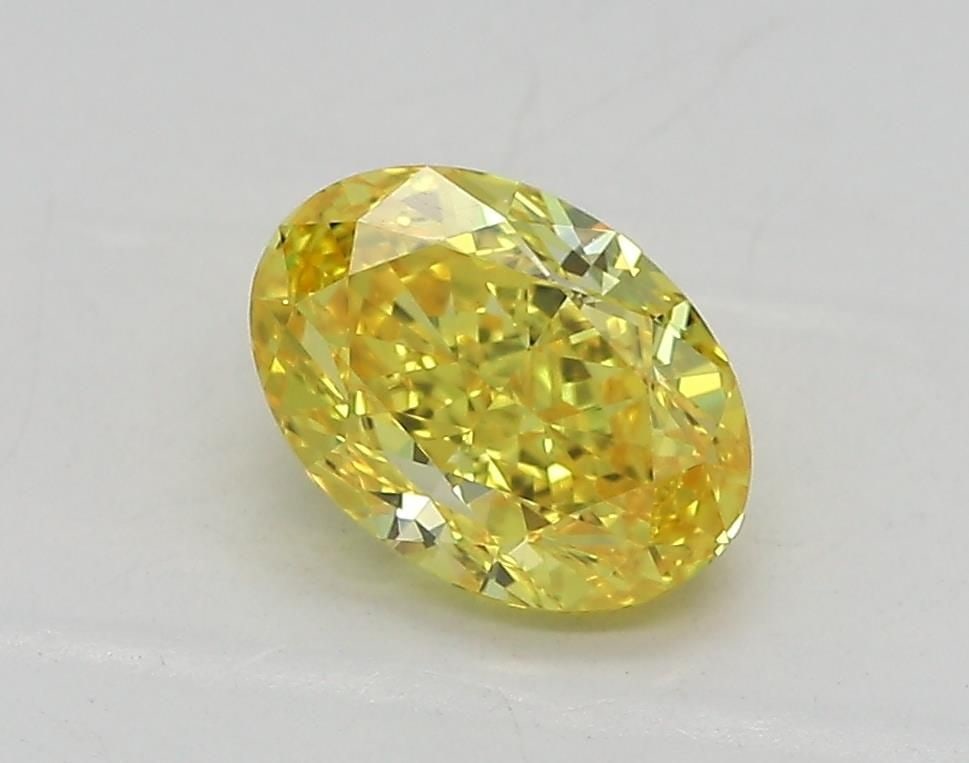 Loose Diamond - OVAL 1.02ct Fancy Vivid Yellow VVS2: Loose Diamond - OVAL 1.02ct Fancy Vivid Yellow VVS2 Source: This is a real non-mined Diamond that has been grown in a lab Shape: OVAL Carats: 1.02 Color: Fancy Vivid Yellow Certification: IGI Video: