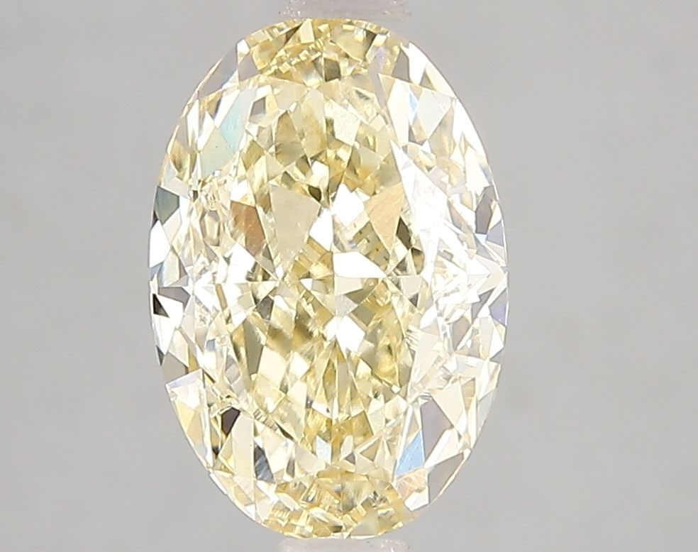 Loose Diamond - OVAL 3.01ct Fancy Intense Yellow VS1: Loose Diamond - OVAL 3.01ct Fancy Intense Yellow VS1 Source: This is a real non-mined Diamond that has been grown in a lab Shape: OVAL Carats: 3.01 Color: Fancy Intense Yellow Certification: IGI Video