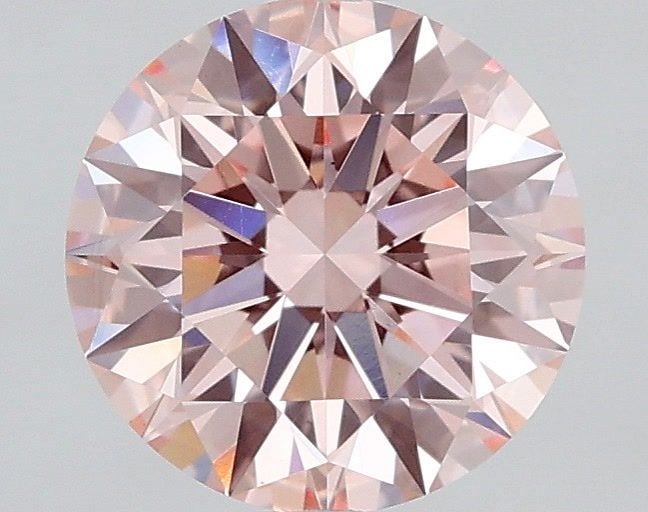 Ideal Loose Diamond - ROUND 1.2ct Fancy Vivid Pink VS1: Ideal Loose Diamond - ROUND 1.2ct Fancy Vivid Pink VS1 Source: This is a real non-mined Diamond that has been grown in a lab Shape: ROUND Carats: 1.2 Color: Fancy Vivid Pink Certification: IGI Video: