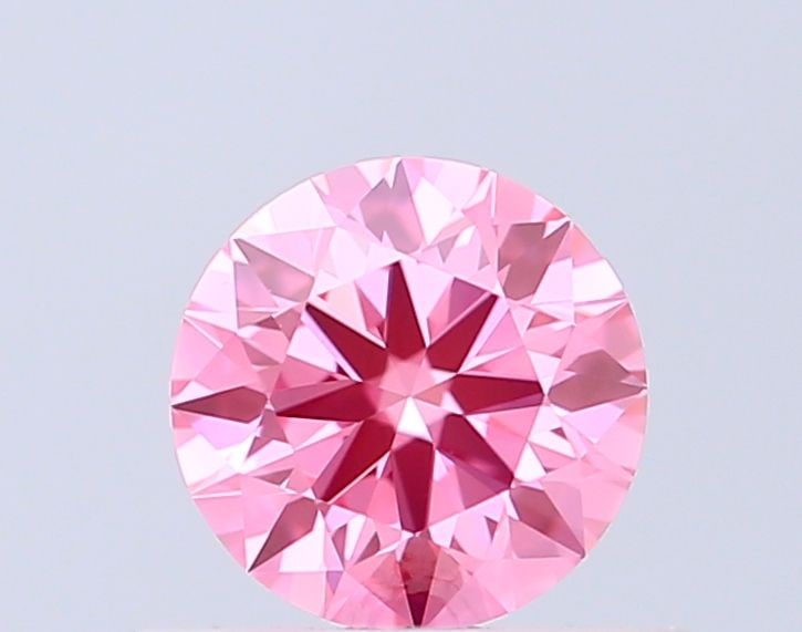 Ideal Loose Diamond - ROUND 0.54ct Fancy Vivid Pink VVS2: Ideal Loose Diamond - ROUND 0.54ct Fancy Vivid Pink VVS2 Source: This is a real non-mined Diamond that has been grown in a lab Shape: ROUND Carats: 0.54 Color: Fancy Vivid Pink Certification: IGI Vide