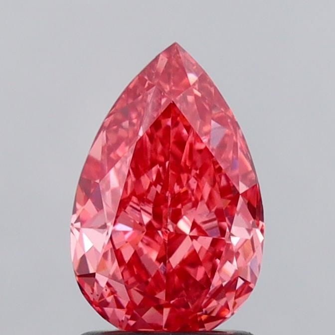 Loose Diamond - PEAR 1.58ct Fancy Vivid Pink VS1: Loose Diamond - PEAR 1.58ct Fancy Vivid Pink VS1 Source: This is a real non-mined Diamond that has been grown in a lab Shape: PEAR Carats: 1.58 Color: Fancy Vivid Pink Certification: IGI Video: