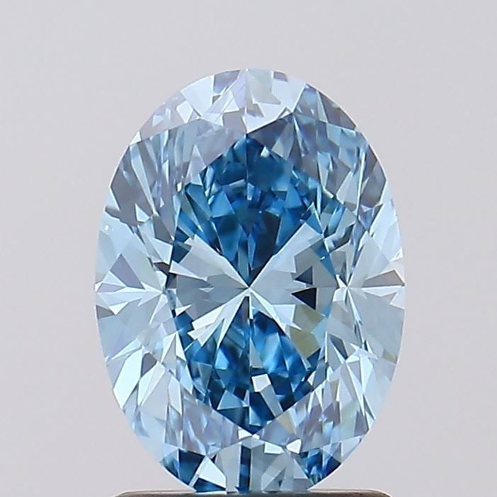 Loose Diamond - OVAL 1.67ct Fancy Vivid Blue VS1: Loose Diamond - OVAL 1.67ct Fancy Vivid Blue VS1 Source: This is a real non-mined Diamond that has been grown in a lab Shape: OVAL Carats: 1.67 Color: Fancy Vivid Blue Certification: IGI Video: