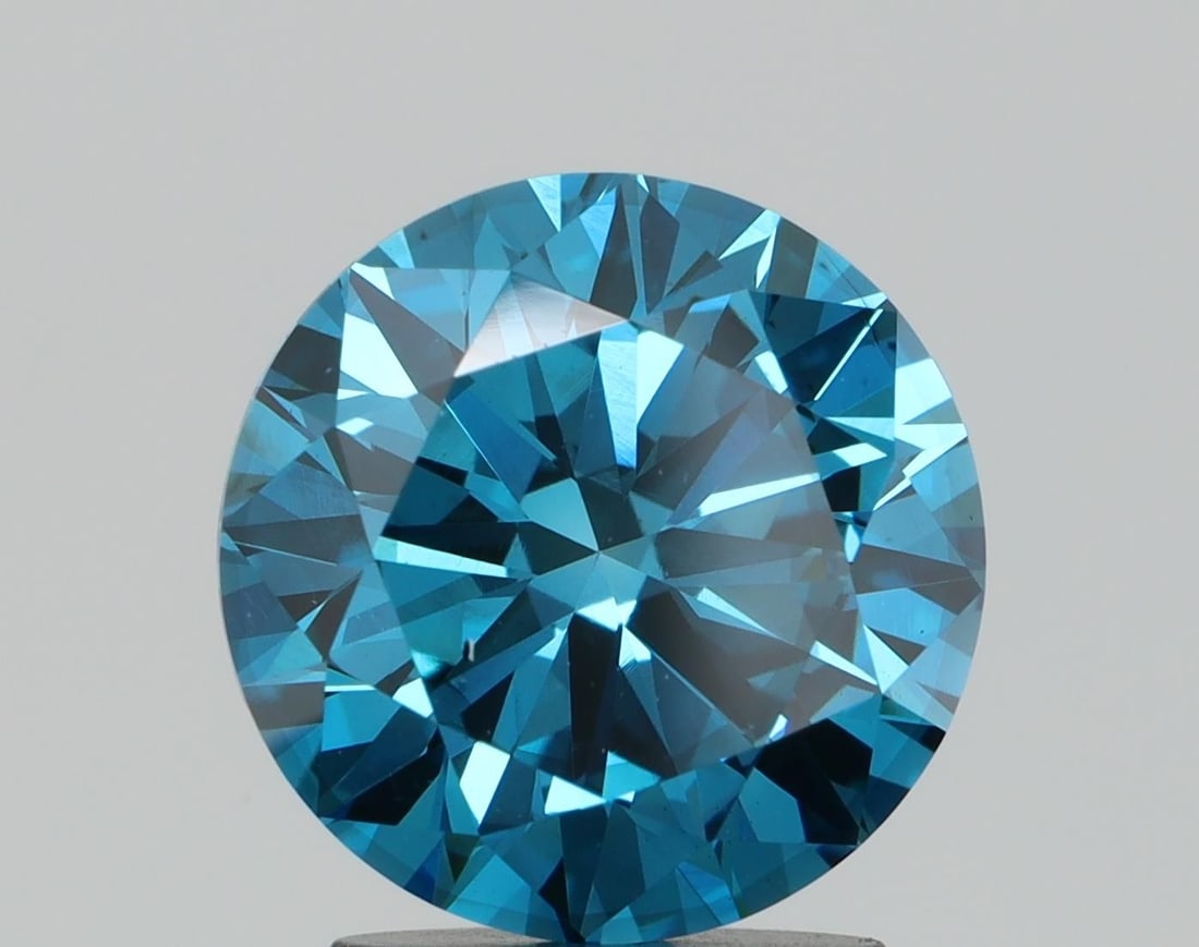 Loose Diamond - ROUND 2.15ct Fancy Blue SI1: Loose Diamond - ROUND 2.15ct Fancy Blue SI1 Source: This is a real non-mined Diamond that has been grown in a lab Shape: ROUND Carats: 2.15 Color: Fancy Blue Certification: NONE Video: