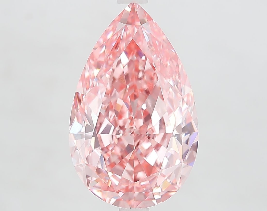 Loose Diamond - PEAR 5.65ct Fancy Vivid Pink VVS2: Loose Diamond - PEAR 5.65ct Fancy Vivid Pink VVS2 Source: This is a real non-mined Diamond that has been grown in a lab Shape: PEAR Carats: 5.65 Color: Fancy Vivid Pink Certification: IGI Video: