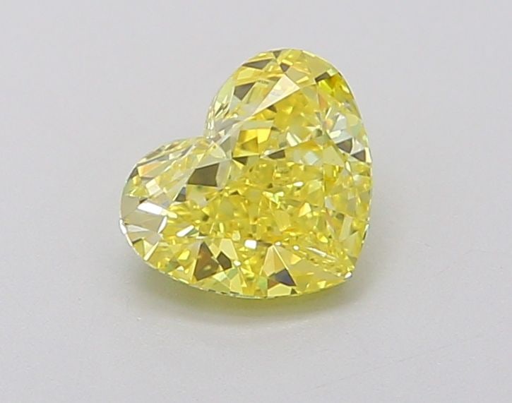 Loose Diamond - HEART 1.01ct Fancy Vivid Yellow VVS2: Loose Diamond - HEART 1.01ct Fancy Vivid Yellow VVS2 Source: This is a real non-mined Diamond that has been grown in a lab Shape: HEART Carats: 1.01 Color: Fancy Vivid Yellow Certification: IGI Video: