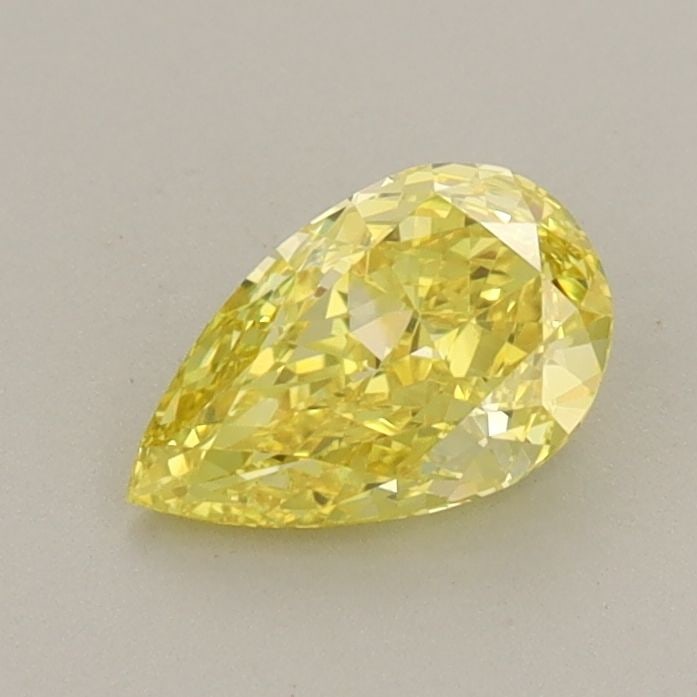 Loose Diamond - PEAR 0.63ct Fancy Vivid Yellow VVS2: Loose Diamond - PEAR 0.63ct Fancy Vivid Yellow VVS2 Source: This is a real non-mined Diamond that has been grown in a lab Shape: PEAR Carats: 0.63 Color: Fancy Vivid Yellow Certification: IGI Video: