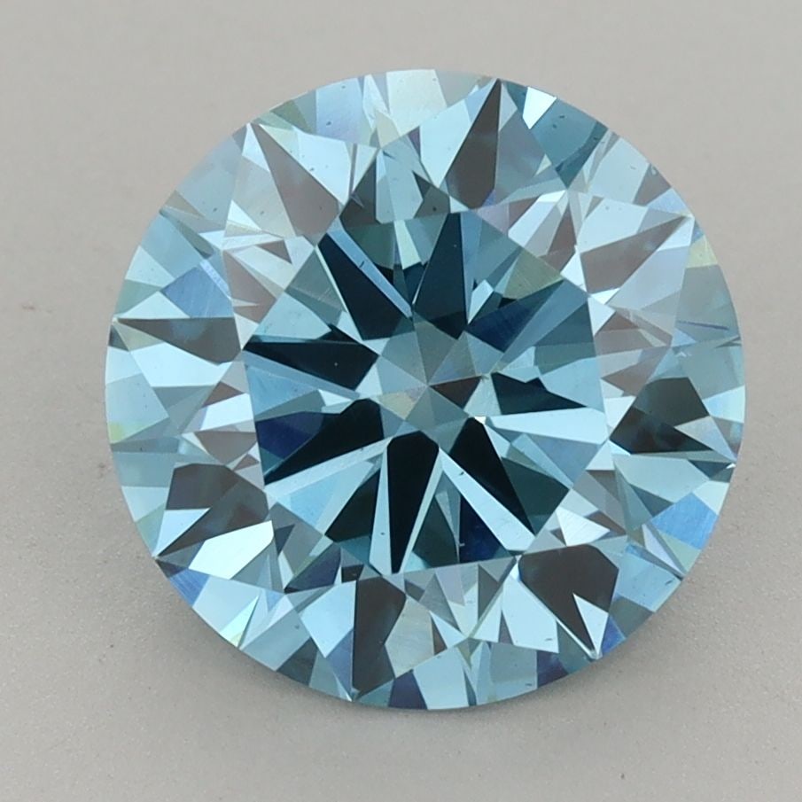 Ideal Loose Diamond - ROUND 3.69ct Fancy Vivid Blue VS2: Ideal Loose Diamond - ROUND 3.69ct Fancy Vivid Blue VS2 Source: This is a real non-mined Diamond that has been grown in a lab Shape: ROUND Carats: 3.69 Color: Fancy Vivid Blue Certification: IGI Video