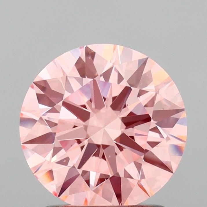 Ideal Loose Diamond - ROUND 1.5ct Fancy Vivid Pink VS2: Ideal Loose Diamond - ROUND 1.5ct Fancy Vivid Pink VS2 Source: This is a real non-mined Diamond that has been grown in a lab Shape: ROUND Carats: 1.5 Color: Fancy Vivid Pink Certification: IGI Video: