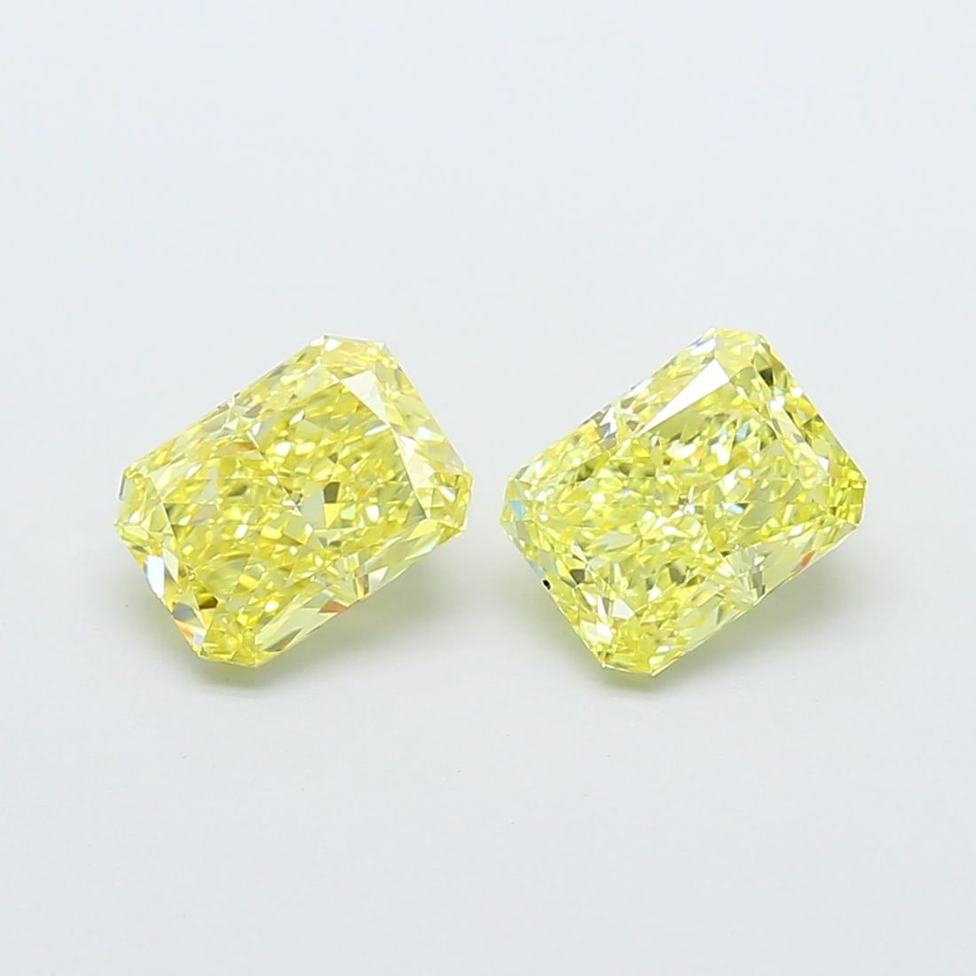 Loose Diamond - RADIANT 1.41ct Fancy Intense Yellow VVS2: Loose Diamond - RADIANT 1.41ct Fancy Intense Yellow VVS2 Source: This is a real non-mined Diamond that has been grown in a lab Shape: RADIANT Carats: 1.41 Color: Fancy Intense Yellow Certification: IG
