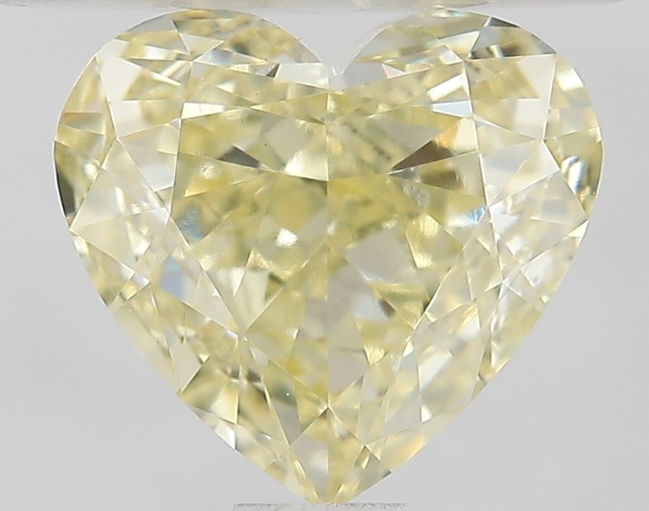 Loose Diamond - HEART 1.03ct Fancy Yellow VVS2: Loose Diamond - HEART 1.03ct Fancy Yellow VVS2 Source: This is a real non-mined Diamond that has been grown in a lab Shape: HEART Carats: 1.03 Color: Fancy Yellow Certification: IGI Video: