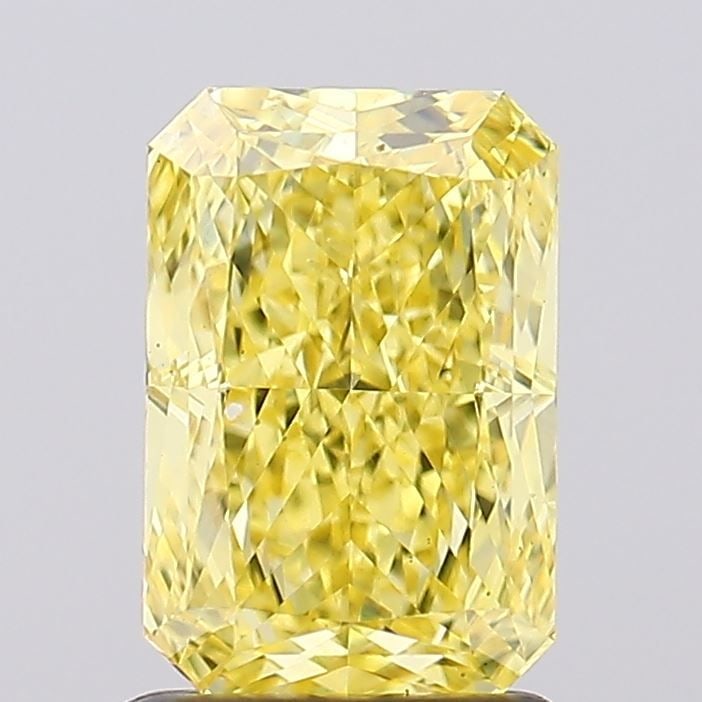 Loose Diamond - RADIANT 1.55ct Fancy Vivid Yellow VS2: Loose Diamond - RADIANT 1.55ct Fancy Vivid Yellow VS2 Source: This is a real non-mined Diamond that has been grown in a lab Shape: RADIANT Carats: 1.55 Color: Fancy Vivid Yellow Certification: IGI Vid