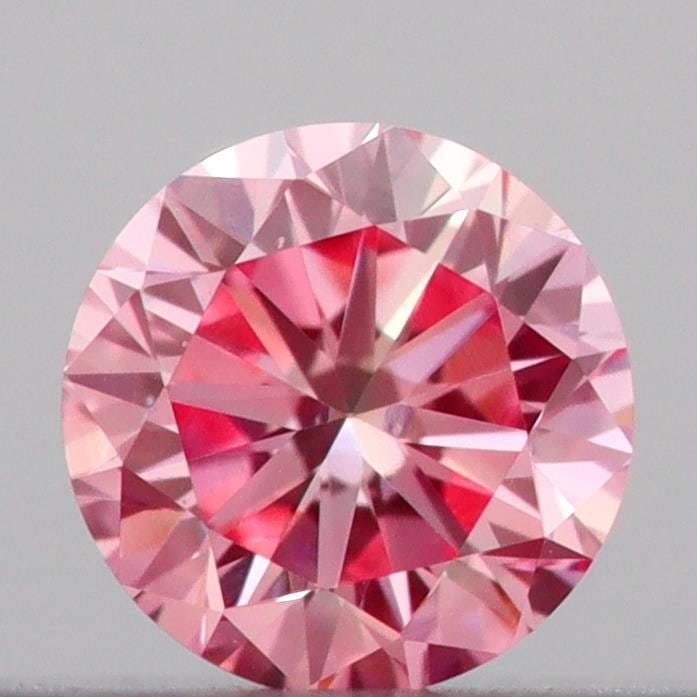 Loose Diamond - ROUND 0.14ct Fancy Vivid Pink VS1: Loose Diamond - ROUND 0.14ct Fancy Vivid Pink VS1 Source: This is a real non-mined Diamond that has been grown in a lab Shape: ROUND Carats: 0.14 Color: Fancy Vivid Pink Certification: IGI Video: