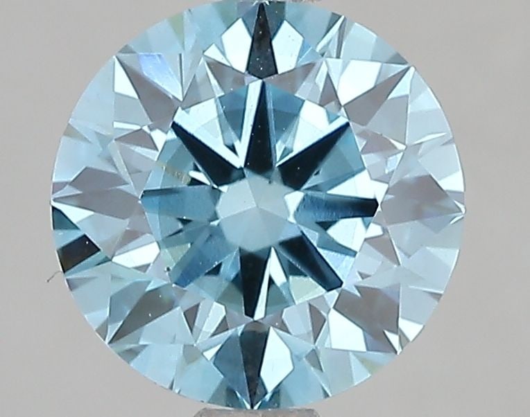 Ideal Loose Diamond - ROUND 2.1ct Fancy Vivid Blue SI1: Ideal Loose Diamond - ROUND 2.1ct Fancy Vivid Blue SI1 Source: This is a real non-mined Diamond that has been grown in a lab Shape: ROUND Carats: 2.1 Color: Fancy Vivid Blue Certification: IGI Video: