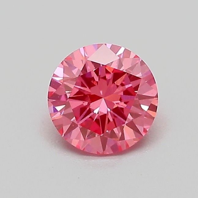 Loose Diamond - ROUND 0.5ct Fancy Vivid Pink VS1: Loose Diamond - ROUND 0.5ct Fancy Vivid Pink VS1 Source: This is a real non-mined Diamond that has been grown in a lab Shape: ROUND Carats: 0.5 Color: Fancy Vivid Pink Certification: IGI Video: Video