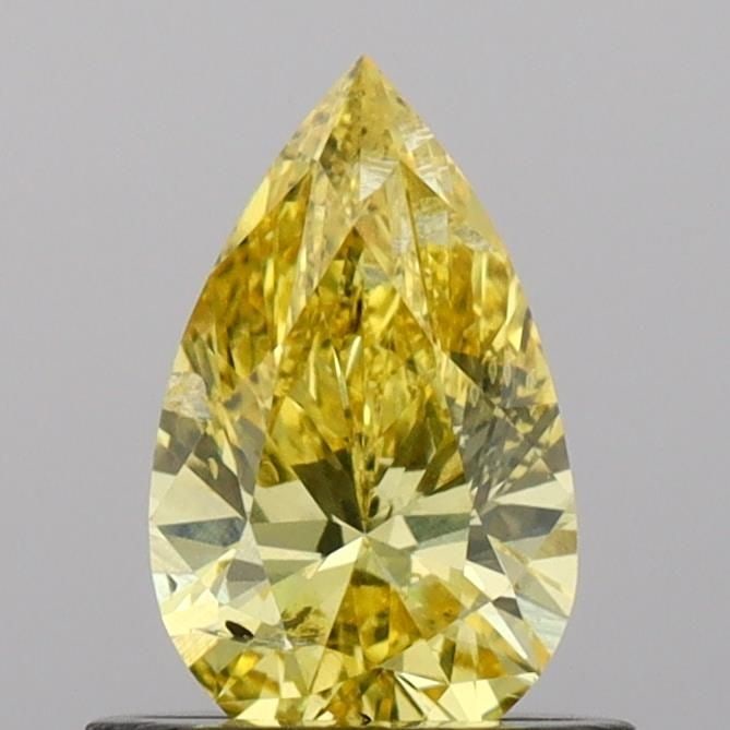 Loose Diamond - PEAR 0.62ct Fancy Vivid Yellow SI2: Loose Diamond - PEAR 0.62ct Fancy Vivid Yellow SI2 Source: This is a real non-mined Diamond that has been grown in a lab Shape: PEAR Carats: 0.62 Color: Fancy Vivid Yellow Certification: IGI Video: