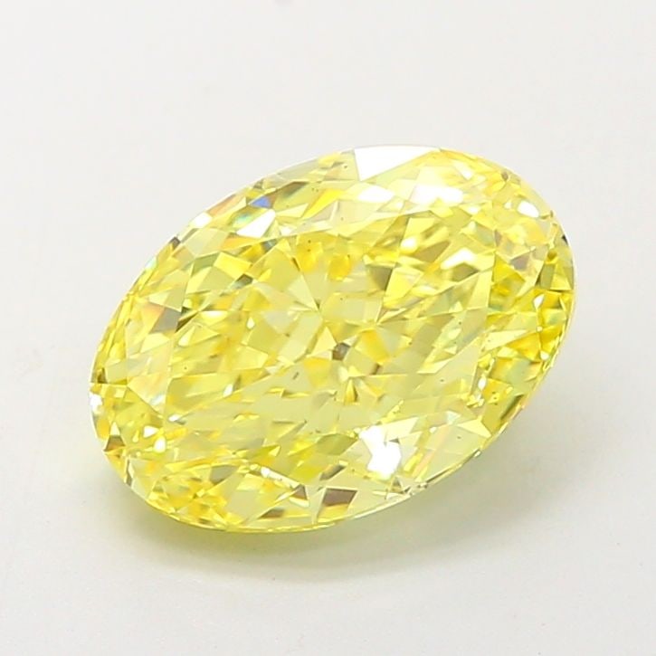 Loose Diamond - OVAL 2.84ct Fancy Vivid Yellow VS2: Loose Diamond - OVAL 2.84ct Fancy Vivid Yellow VS2 Source: This is a real non-mined Diamond that has been grown in a lab Shape: OVAL Carats: 2.84 Color: Fancy Vivid Yellow Certification: IGI Video: