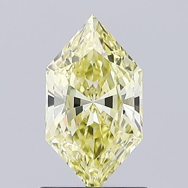 Loose Diamond - HEXAGONAL 1.02ct Fancy Yellow VVS2: Loose Diamond - HEXAGONAL 1.02ct Fancy Yellow VVS2 Source: This is a real non-mined Diamond that has been grown in a lab Shape: HEXAGONAL Carats: 1.02 Color: Fancy Yellow Certification: IGI Video: