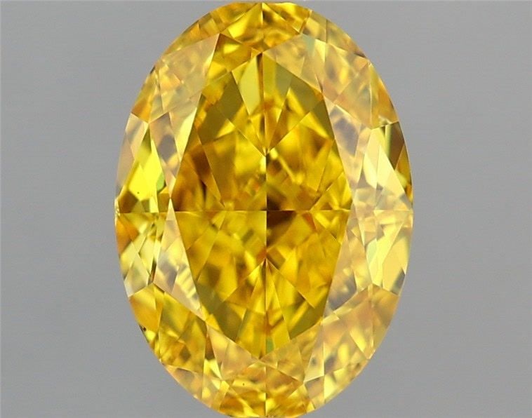 Loose Diamond - OVAL 2.03ct Fancy Vivid Yellow VVS2: Loose Diamond - OVAL 2.03ct Fancy Vivid Yellow VVS2 Source: This is a real non-mined Diamond that has been grown in a lab Shape: OVAL Carats: 2.03 Color: Fancy Vivid Yellow Certification: IGI Video: