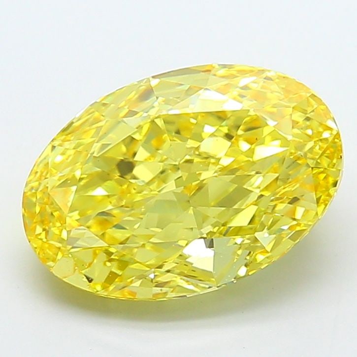 Loose Diamond - OVAL 7.07ct Fancy Vivid Yellow VS2: Loose Diamond - OVAL 7.07ct Fancy Vivid Yellow VS2 Source: This is a real non-mined Diamond that has been grown in a lab Shape: OVAL Carats: 7.07 Color: Fancy Vivid Yellow Certification: IGI Video: