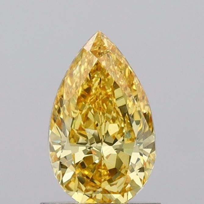 Loose Diamond - PEAR 1.04ct Fancy Vivid Yellow VS1: Loose Diamond - PEAR 1.04ct Fancy Vivid Yellow VS1 Source: This is a real non-mined Diamond that has been grown in a lab Shape: PEAR Carats: 1.04 Color: Fancy Vivid Yellow Certification: IGI Video: