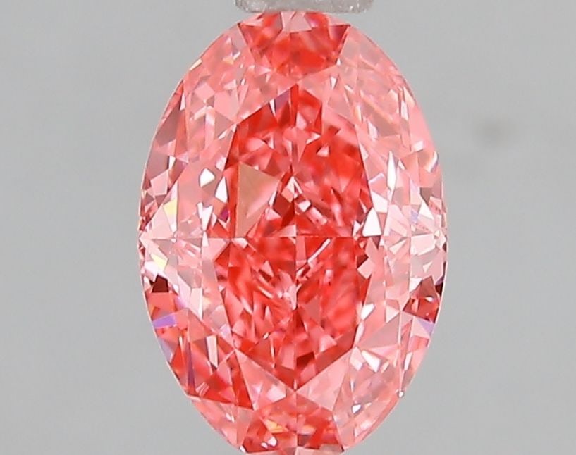 Loose Diamond - OVAL 1.53ct Fancy Vivid Pink VS2: Loose Diamond - OVAL 1.53ct Fancy Vivid Pink VS2 Source: This is a real non-mined Diamond that has been grown in a lab Shape: OVAL Carats: 1.53 Color: Fancy Vivid Pink Certification: IGI Video: