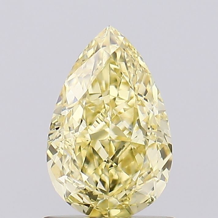 Loose Diamond - PEAR 1.07ct Fancy Yellow VS1: Loose Diamond - PEAR 1.07ct Fancy Yellow VS1 Source: This is a real non-mined Diamond that has been grown in a lab Shape: PEAR Carats: 1.07 Color: Fancy Yellow Certification: IGI Video: