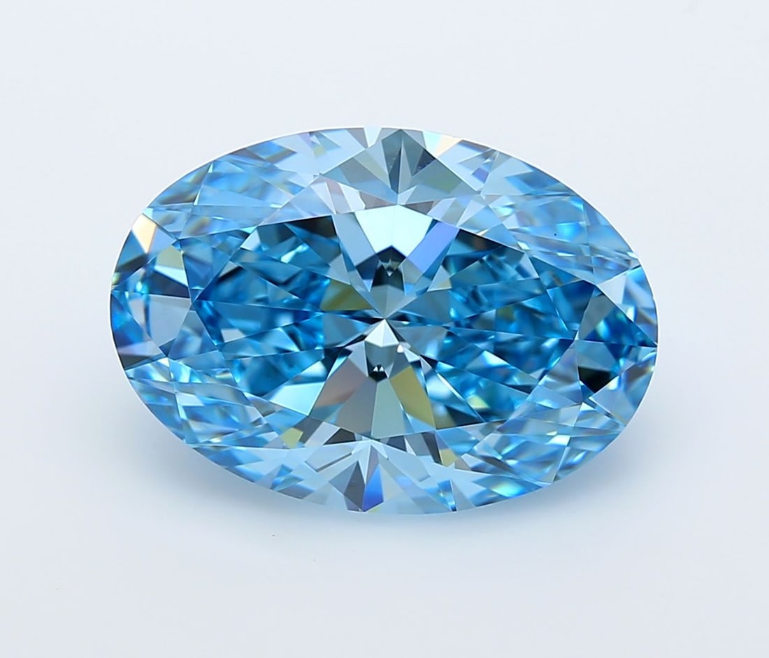 Loose Diamond - OVAL 6.3ct Fancy Vivid Blue VVS1: Loose Diamond - OVAL 6.3ct Fancy Vivid Blue VVS1 Source: This is a real non-mined Diamond that has been grown in a lab Shape: OVAL Carats: 6.3 Color: Fancy Vivid Blue Certification: IGI Video: