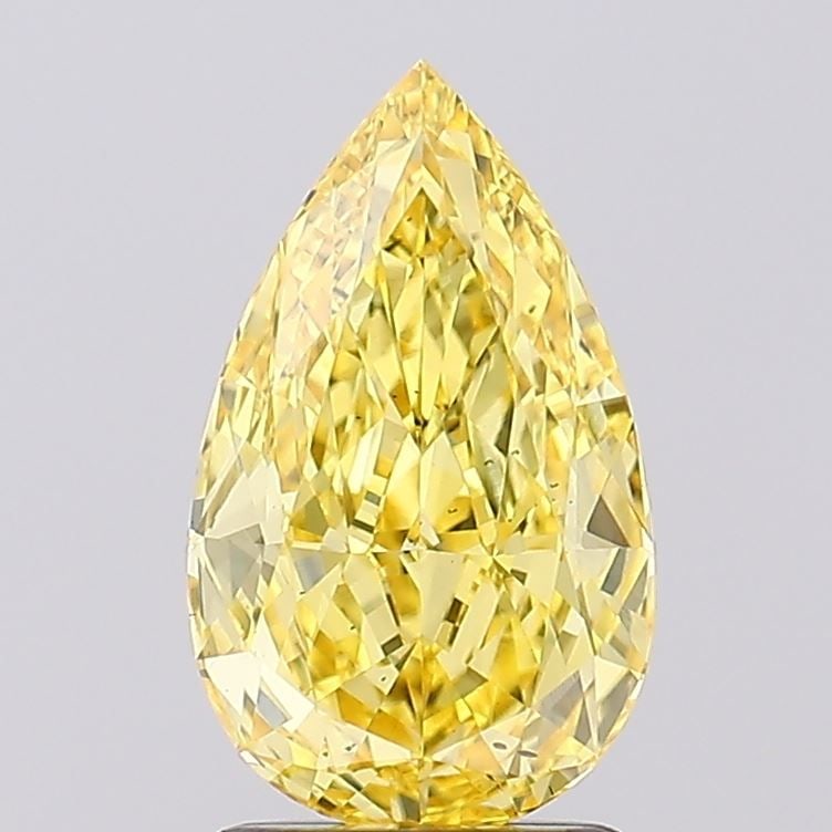 Loose Diamond - PEAR 2.03ct Fancy Vivid Yellow VS2: Loose Diamond - PEAR 2.03ct Fancy Vivid Yellow VS2 Source: This is a real non-mined Diamond that has been grown in a lab Shape: PEAR Carats: 2.03 Color: Fancy Vivid Yellow Certification: IGI Video: