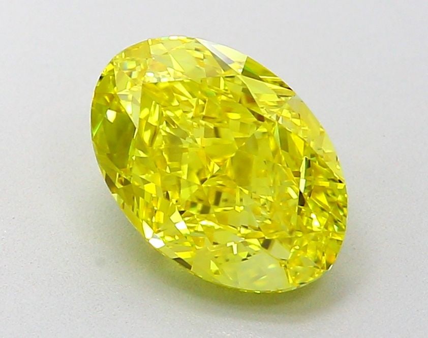 Loose Diamond - OVAL 2.05ct Fancy Vivid Yellow VVS2: Loose Diamond - OVAL 2.05ct Fancy Vivid Yellow VVS2 Source: This is a real non-mined Diamond that has been grown in a lab Shape: OVAL Carats: 2.05 Color: Fancy Vivid Yellow Certification: IGI Video: